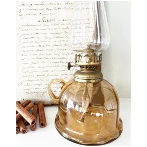 Gorgeous little antique amber oil lamp